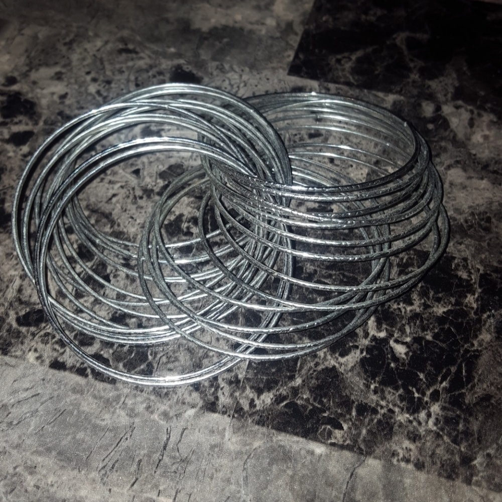 Silver Interlocking Bracelets - image 1